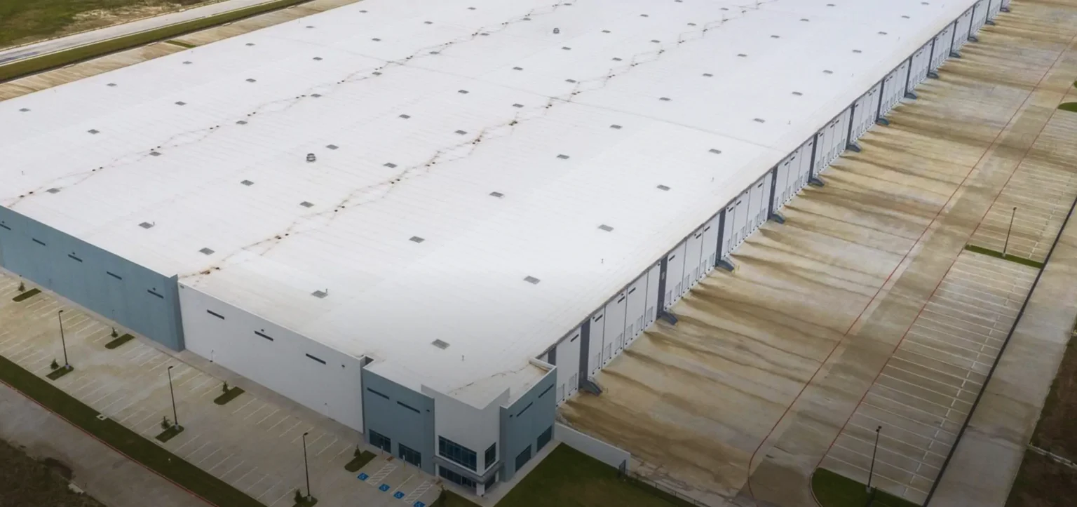 Large-scale warehouse roofing project completed by King of Texas commercial roofing contractor